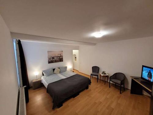 Katil atau katil-katil dalam bilik di Main Square Apartments & More
