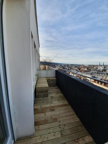 a balcony with a view of a city at Ultra centre - Certainement la plus belle vue de Pau in Pau