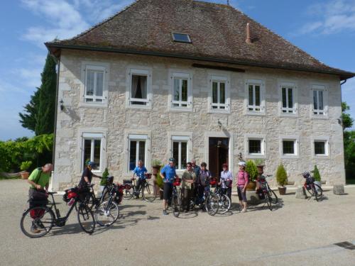a group of people standing in front of a building at Domaine du Manoir in Les Avenières