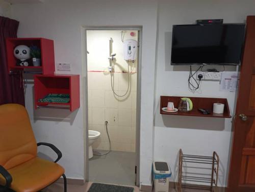 Ένα μπάνιο στο Evonne Budget Hotel