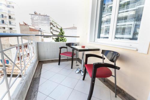 Балкон или терраса в Nomads Rooms