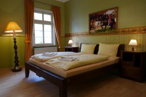 Tagungszentrum-Allerheiligen Hotel Löwenherzにあるベッド