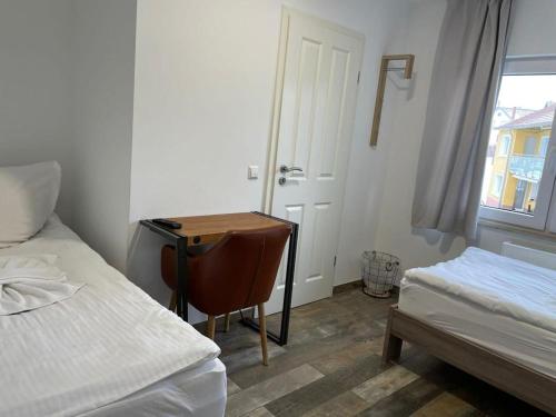 Una cama o camas en una habitación de Grüner Baum