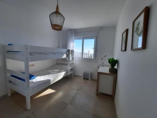 Postel nebo postele na pokoji v ubytování Casa Masaly vistas al mar
