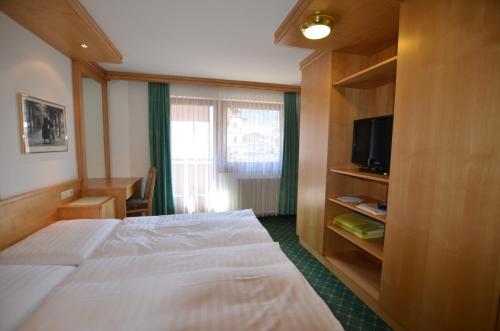 Postel nebo postele na pokoji v ubytování Haus Monika und Haus Claudia
