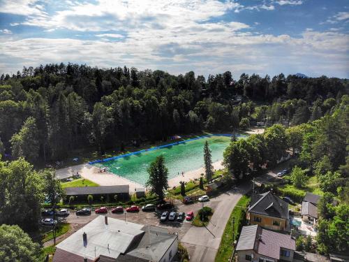an aerial view of a river with a beach at Penzion Stodola in Weisswasser in Böhmen