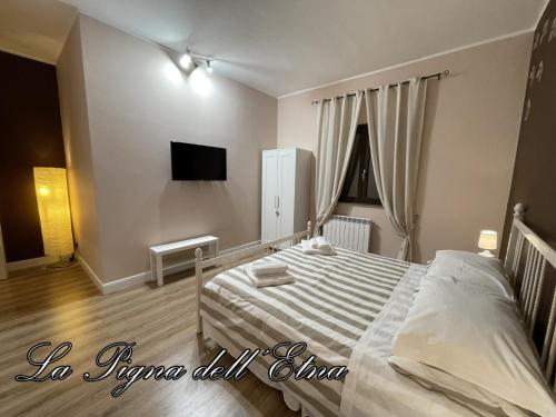 Lova arba lovos apgyvendinimo įstaigoje La Pigna dell'Etna