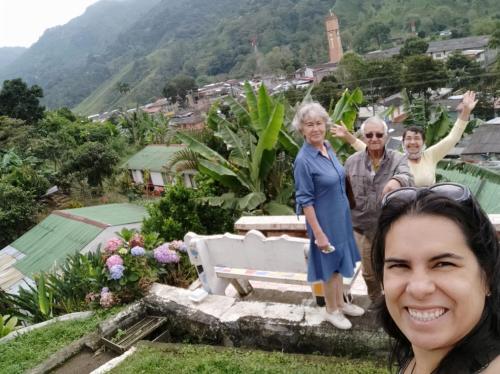 a group of people standing on top of a hill at HOSTAL CASA VICTORIA PIJAO in Pijao