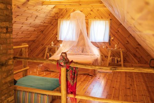 Кровать или кровати в номере Chata Latoś