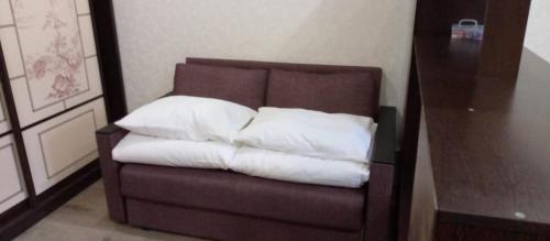 En eller flere senge i et værelse på Гостеприимные апартаменты на Цветочной, Адлер, город Сириус