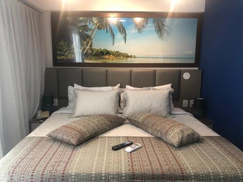 Katil atau katil-katil dalam bilik di Flat Executive Beira Mar