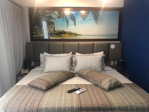 Katil atau katil-katil dalam bilik di Flat Executive Beira Mar