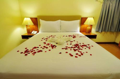 Ένα ή περισσότερα κρεβάτια σε δωμάτιο στο The Well Hotel