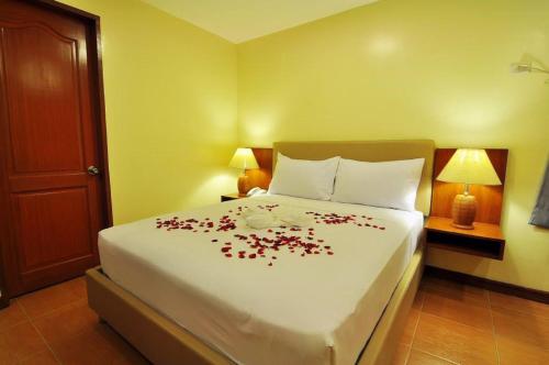 Ένα ή περισσότερα κρεβάτια σε δωμάτιο στο The Well Hotel