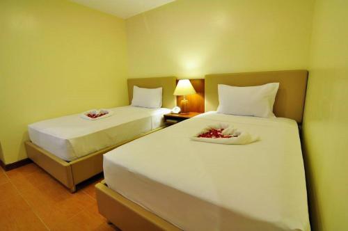 Ένα ή περισσότερα κρεβάτια σε δωμάτιο στο The Well Hotel
