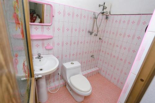 Um banheiro em Green Villa Apartment