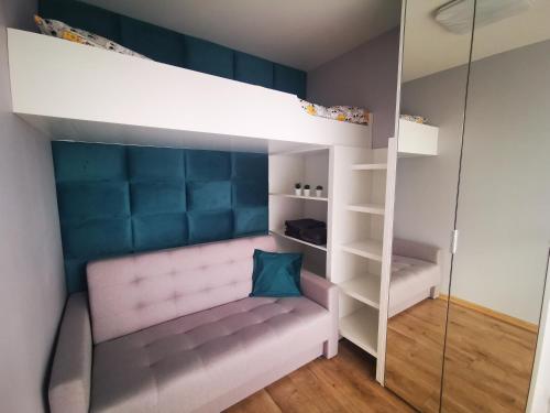 A bunk bed or bunk beds in a room at Apartament AMD deluxe Jastrzębia Góra 200 metrów do Morza