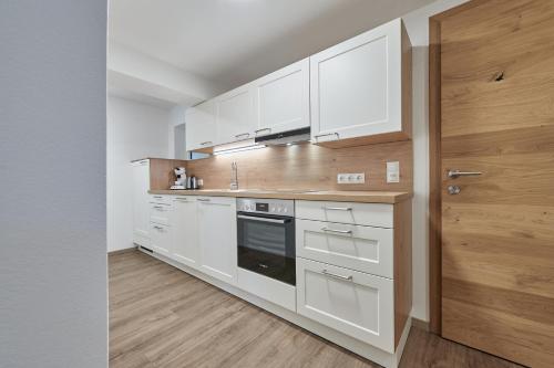 Kuchyň nebo kuchyňský kout v ubytování Appartment Ransburggut