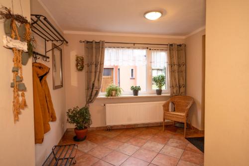 Un lugar para sentarse en Ferienwohnung Schmidt in Altglobsow