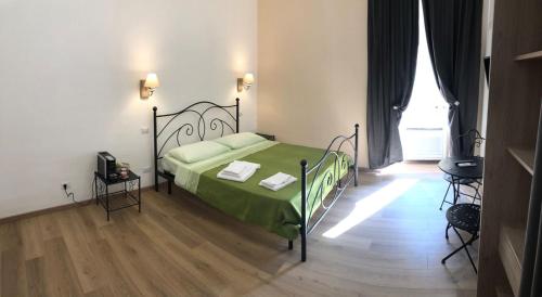 Postel nebo postele na pokoji v ubytování Maison Vaticana