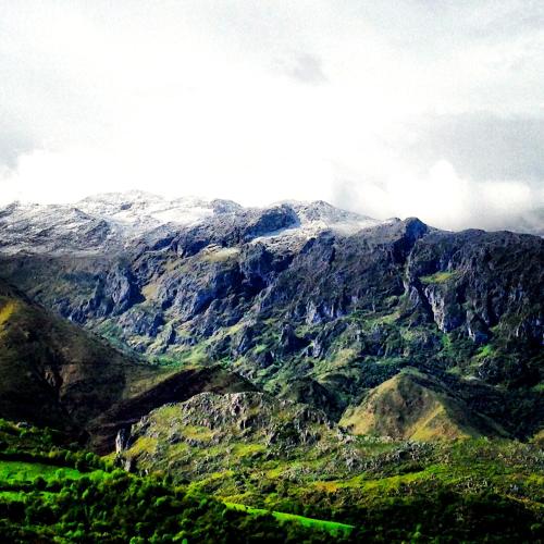 a mountain with snow on top of it at Hotel Alto de las Estazadas in Canales