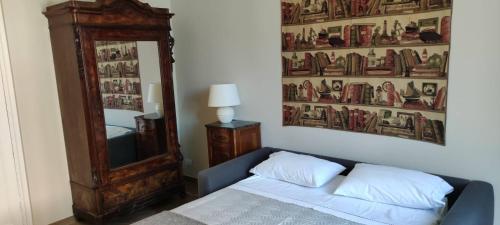 San Giacomo home tesisinde bir odada yatak veya yataklar