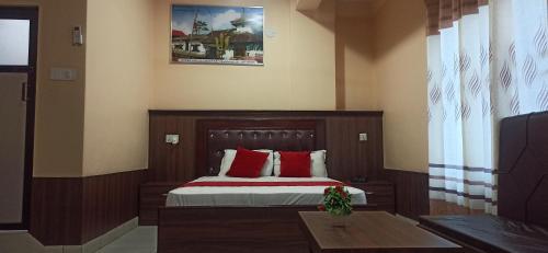 Postel nebo postele na pokoji v ubytování Hotel Royal Chautari, Butwal