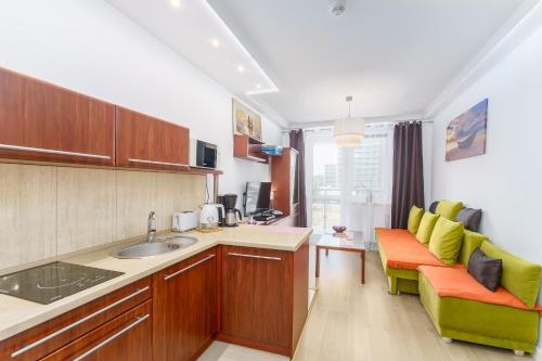 A kitchen or kitchenette at Apartament w Diva Spa 250m do plaży