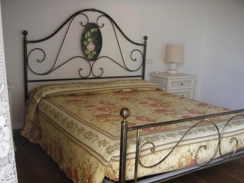 Postel nebo postele na pokoji v ubytování Agriturismo Due Torri