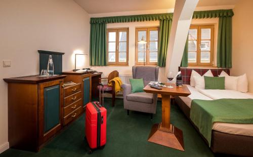 Postel nebo postele na pokoji v ubytování Hotel Saigerhütte