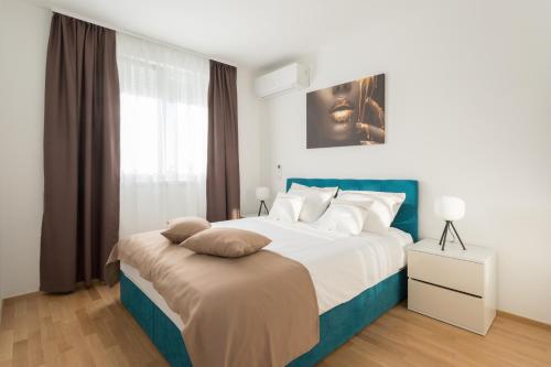 Postel nebo postele na pokoji v ubytování Apartment Ruby