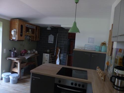 a kitchen with a sink and a stove top oven at Ferienhaus Arendsee in Arendsee