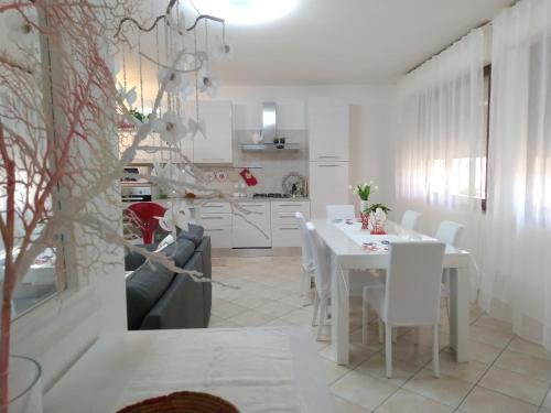 A seating area at Rami di Corallo Appartamento con Parcheggio Privato ----------