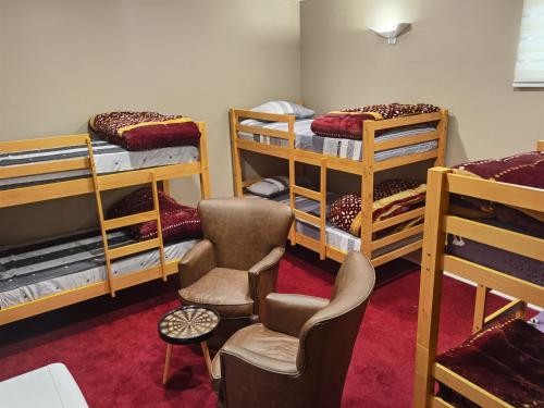 Двох'ярусне ліжко або двоярусні ліжка в номері Casa Paraiso Hotel