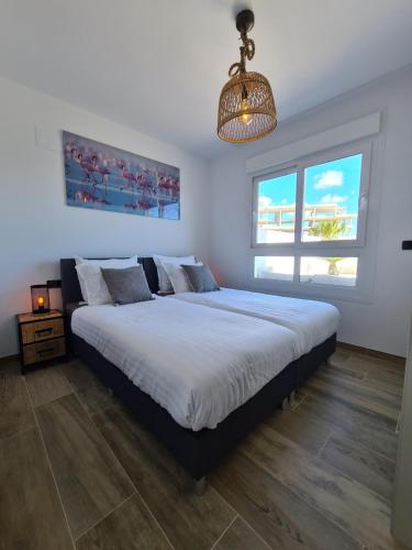 A bed or beds in a room at Residence Bali