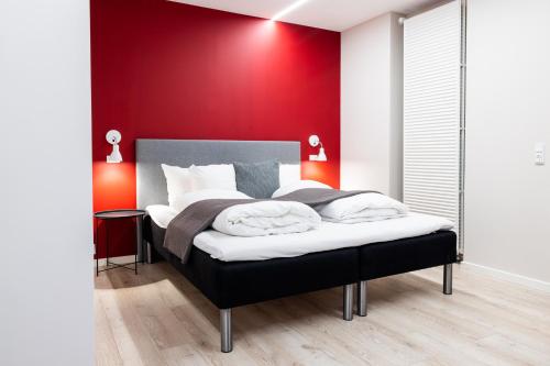 Ένα ή περισσότερα κρεβάτια σε δωμάτιο στο Hotel Sønderborg Kaserne