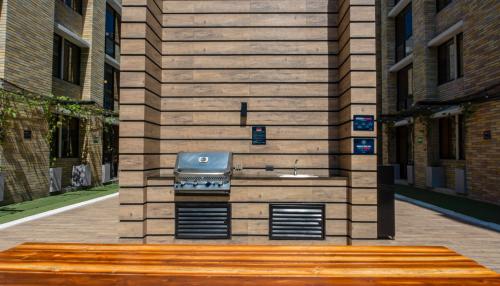 a building with a sink on the side of it at LivinnX Barranquilla in Barranquilla