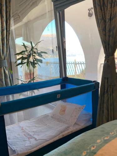 Ένα ή περισσότερα κρεβάτια σε δωμάτιο στο Magnolie Garda