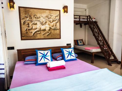 Кровать или кровати в номере Pepper Garden Resort