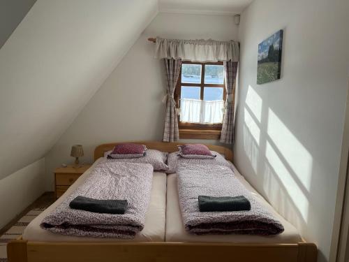 Postel nebo postele na pokoji v ubytování Apartmán Javorník a Javorníček