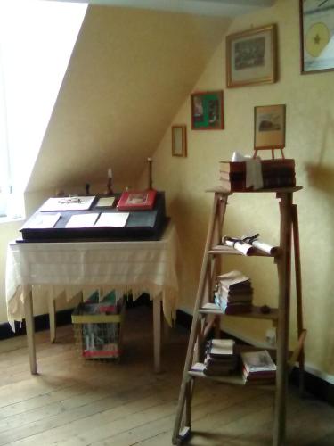 Postel nebo postele na pokoji v ubytování L'Ajoussienne