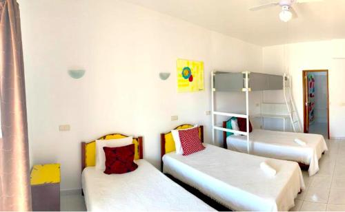 Ένα ή περισσότερα κρεβάτια σε δωμάτιο στο The Central Guesthouse