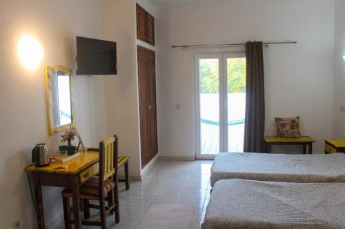 Ένα ή περισσότερα κρεβάτια σε δωμάτιο στο The Central Guesthouse