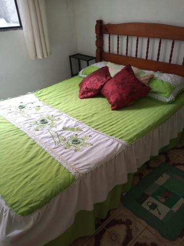 Postel nebo postele na pokoji v ubytování Nilda Casas e Quartos para Aluguel