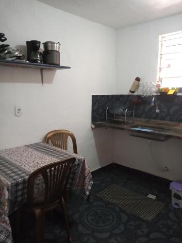 Kuchyň nebo kuchyňský kout v ubytování Nilda Casas e Quartos para Aluguel