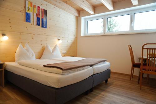 Postel nebo postele na pokoji v ubytování Zenauerhof