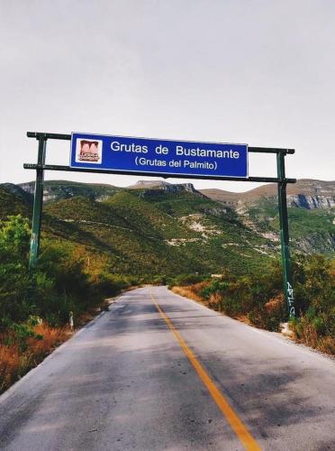 a street sign on the side of a road at La Casita Inn Bustamante in Bustamante