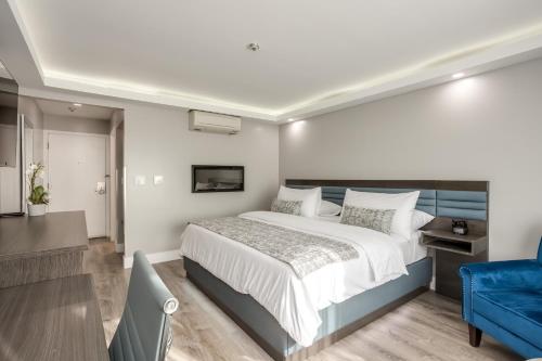 Ένα ή περισσότερα κρεβάτια σε δωμάτιο στο Harbor View Inn