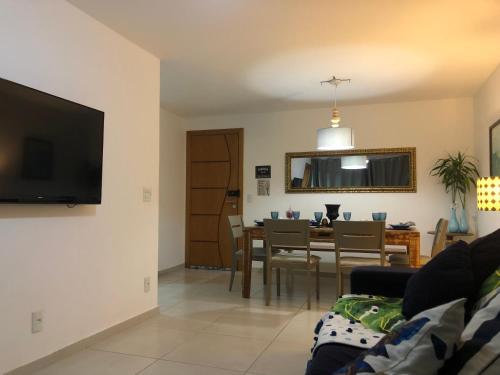 TV a/nebo společenská místnost v ubytování Apartamento Praia Grande