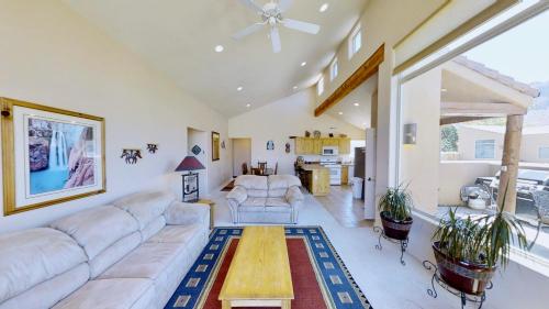 a living room with a couch and a table at Krystal Kiva #K4 in Moab